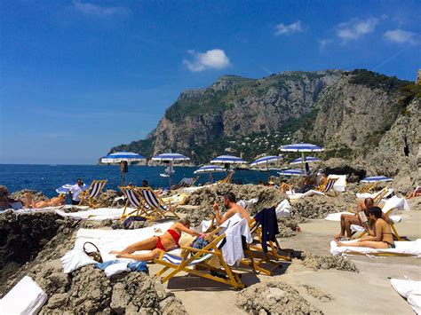 capri beaches with loungers.